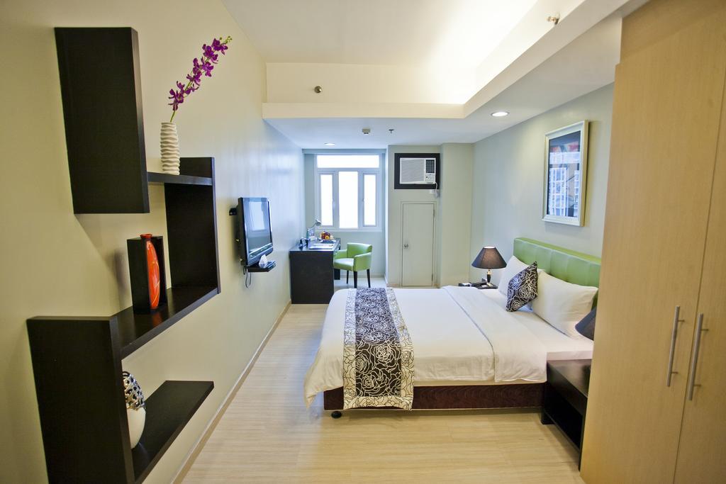 The Exchange Regency Residence Hotel Managed By Hii Pasig City Екстериор снимка