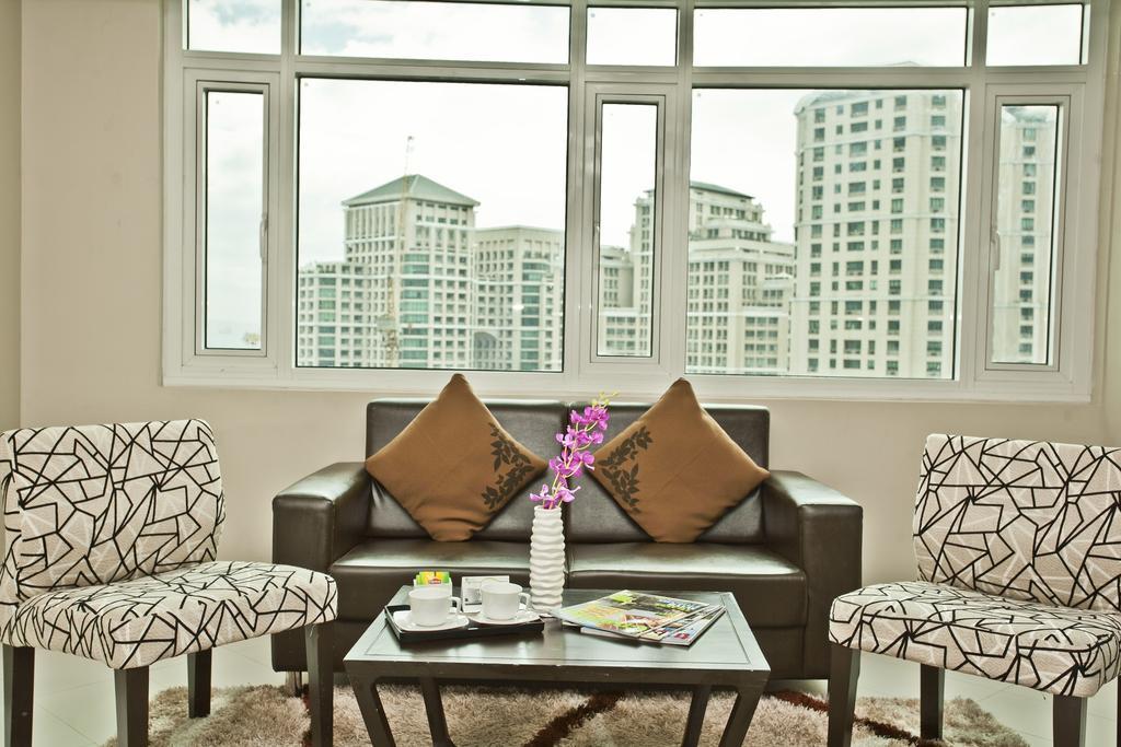 The Exchange Regency Residence Hotel Managed By Hii Pasig City Стая снимка