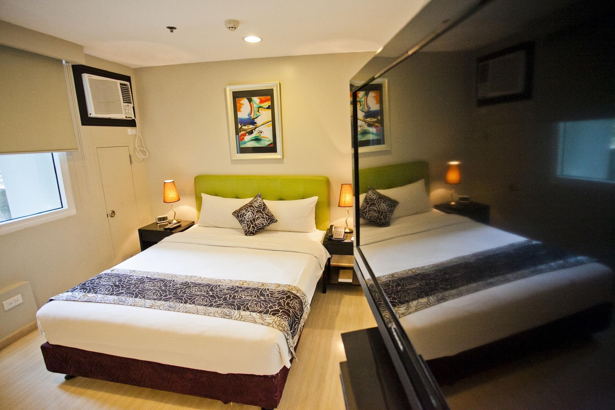 The Exchange Regency Residence Hotel Managed By Hii Pasig City Екстериор снимка