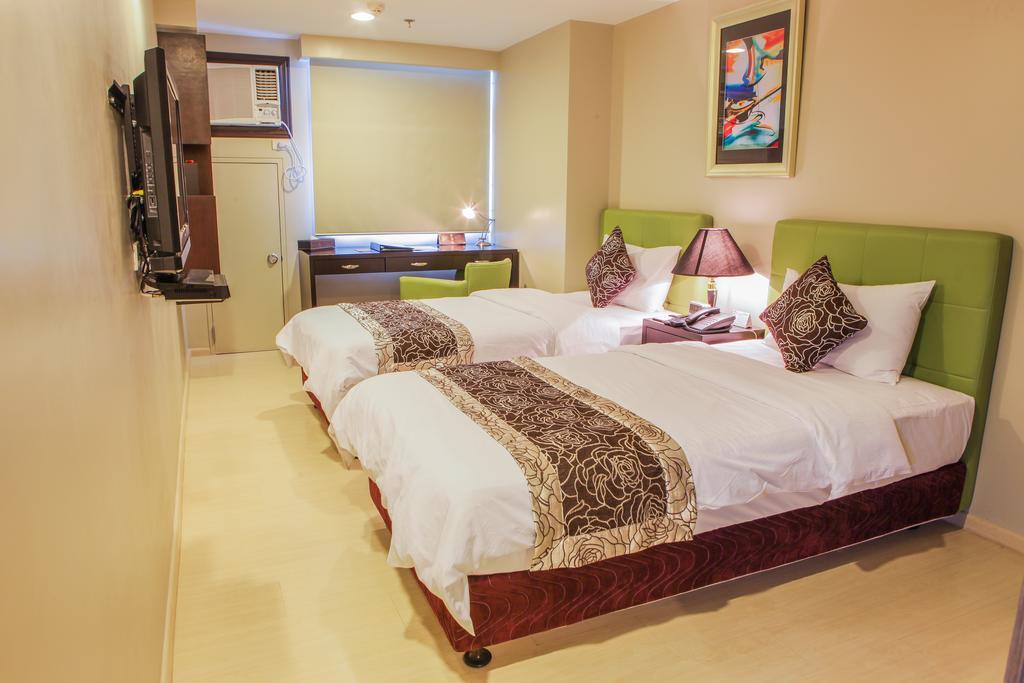 The Exchange Regency Residence Hotel Managed By Hii Pasig City Екстериор снимка